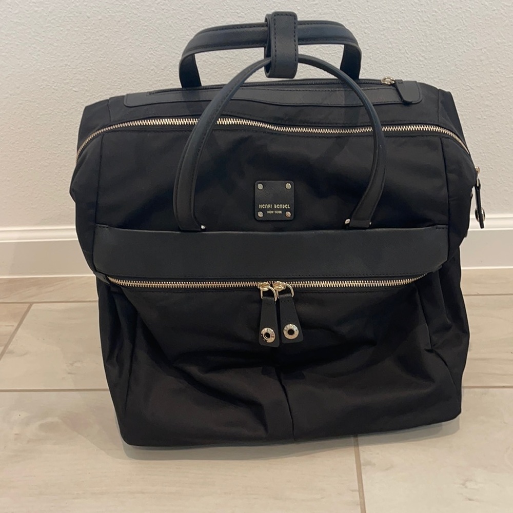 Henri Bendel Black carry on bag with wheels